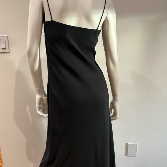 Long black dress with rosette trim across bust. - Picture 4 of 5